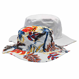 reversible hat showing solid color and floral print sides