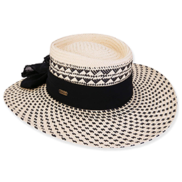 Black and white straw gaucho hat with decorative band for women on a white background