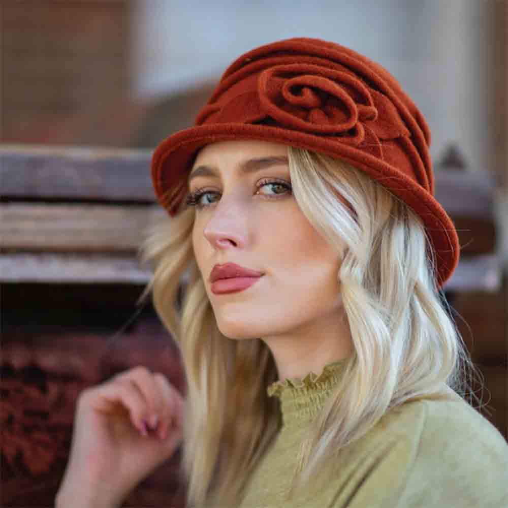 STYLISH LADIES BEANIE HATS. WOMEN WEARING BRICK COLOR BEANIE WITH FLOWER ACCENT